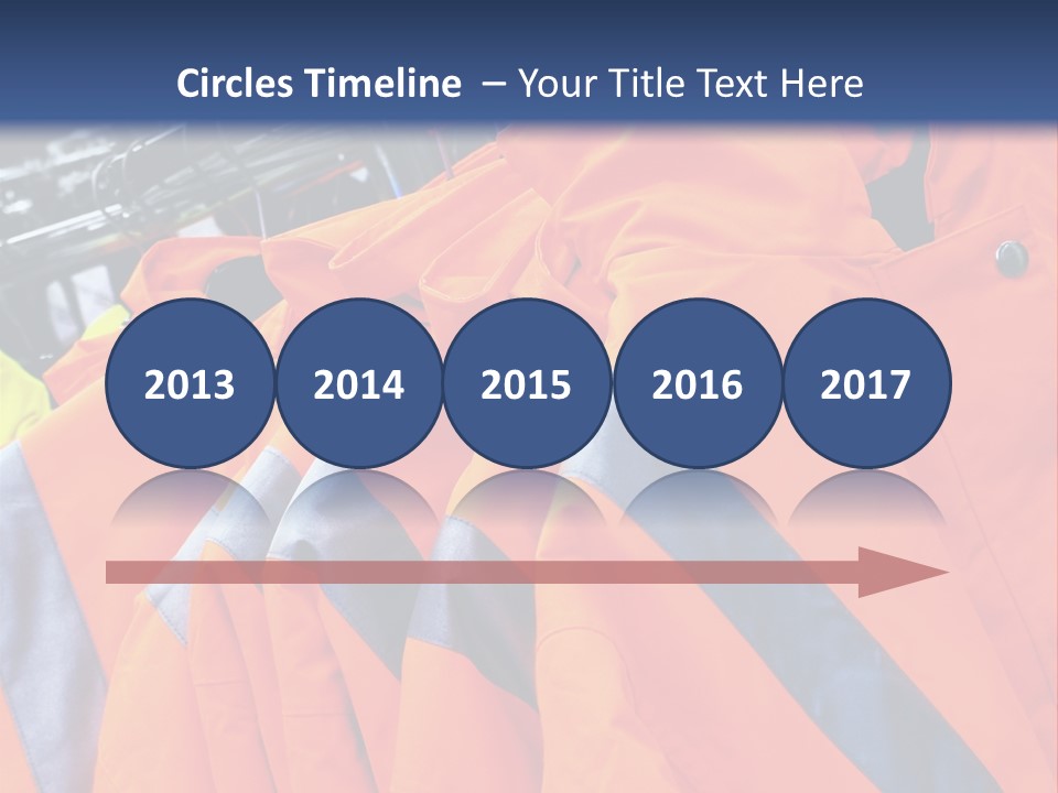 A Group Of Orange Jackets Hanging On A Rack PowerPoint Template