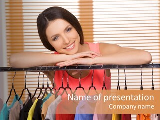 A Woman Standing In Front Of A Rack Of Clothes PowerPoint Template