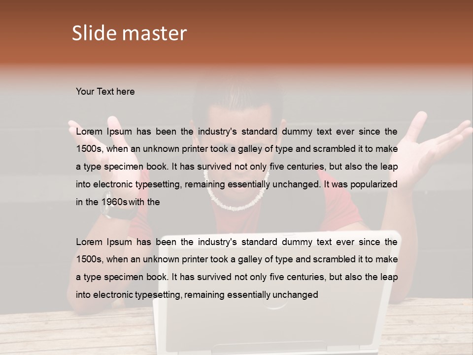 A Man Sitting In Front Of A Laptop Computer PowerPoint Template