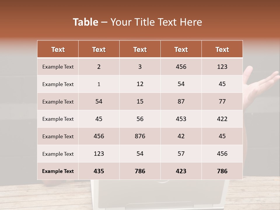 A Man Sitting In Front Of A Laptop Computer PowerPoint Template