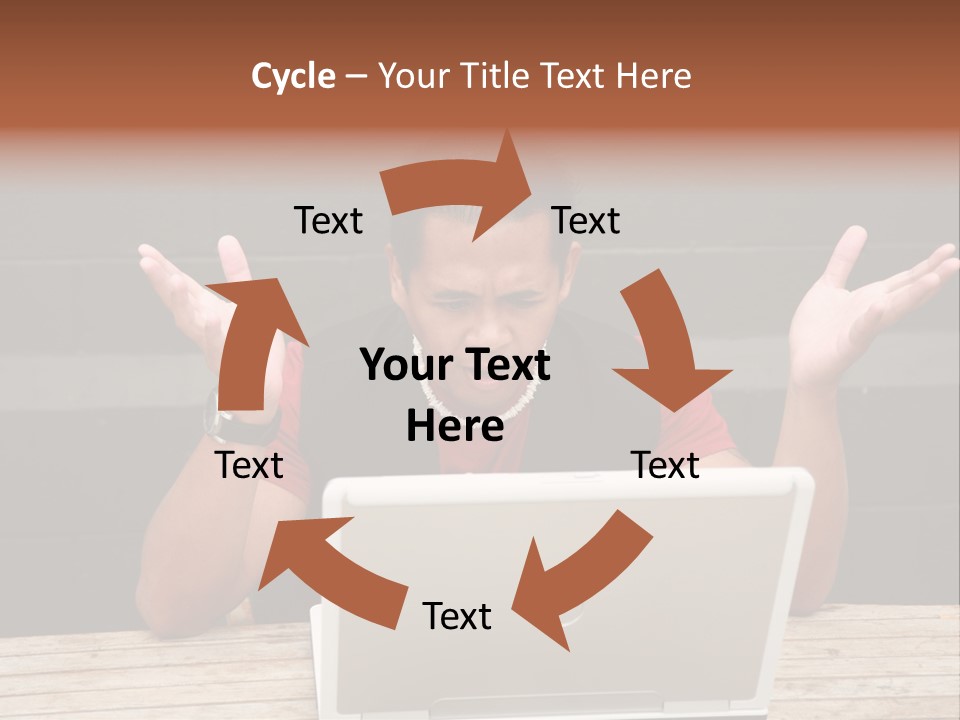 A Man Sitting In Front Of A Laptop Computer PowerPoint Template