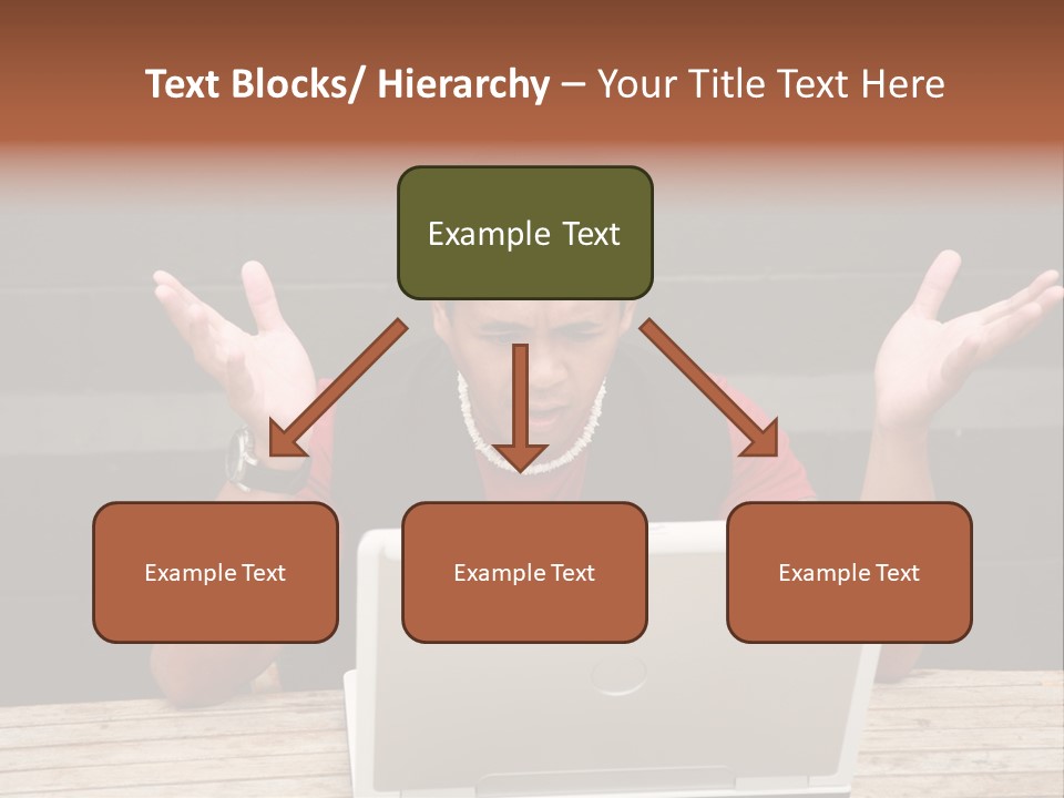 A Man Sitting In Front Of A Laptop Computer PowerPoint Template