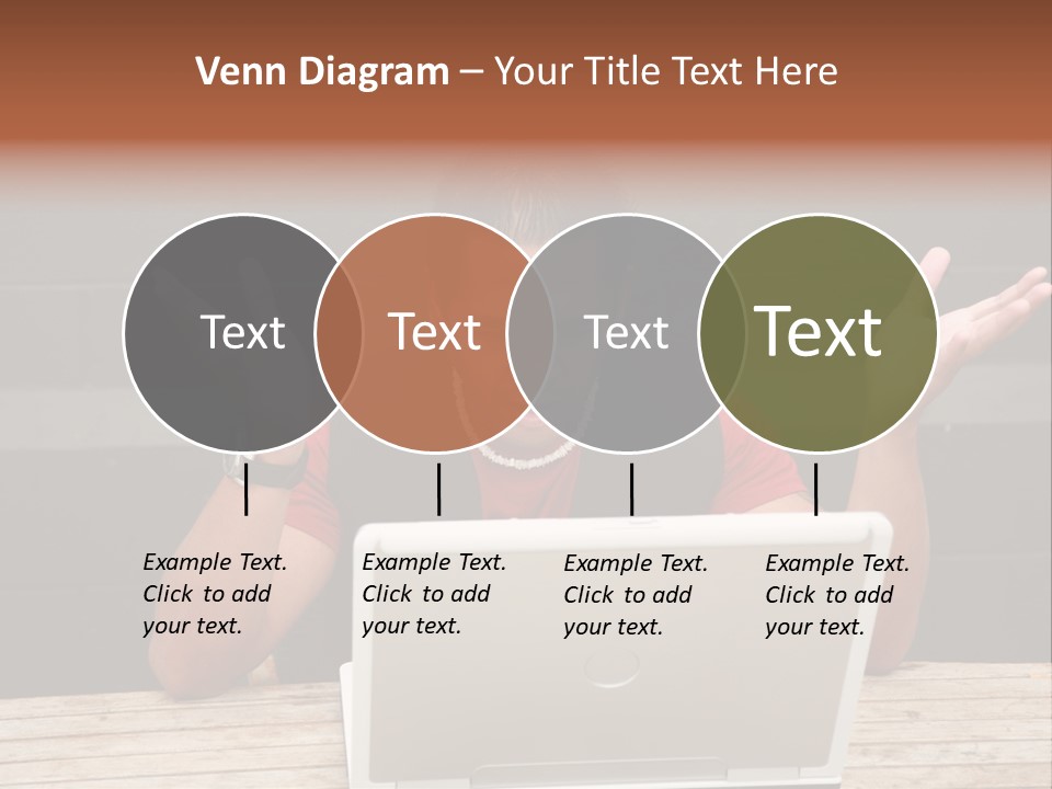 A Man Sitting In Front Of A Laptop Computer PowerPoint Template