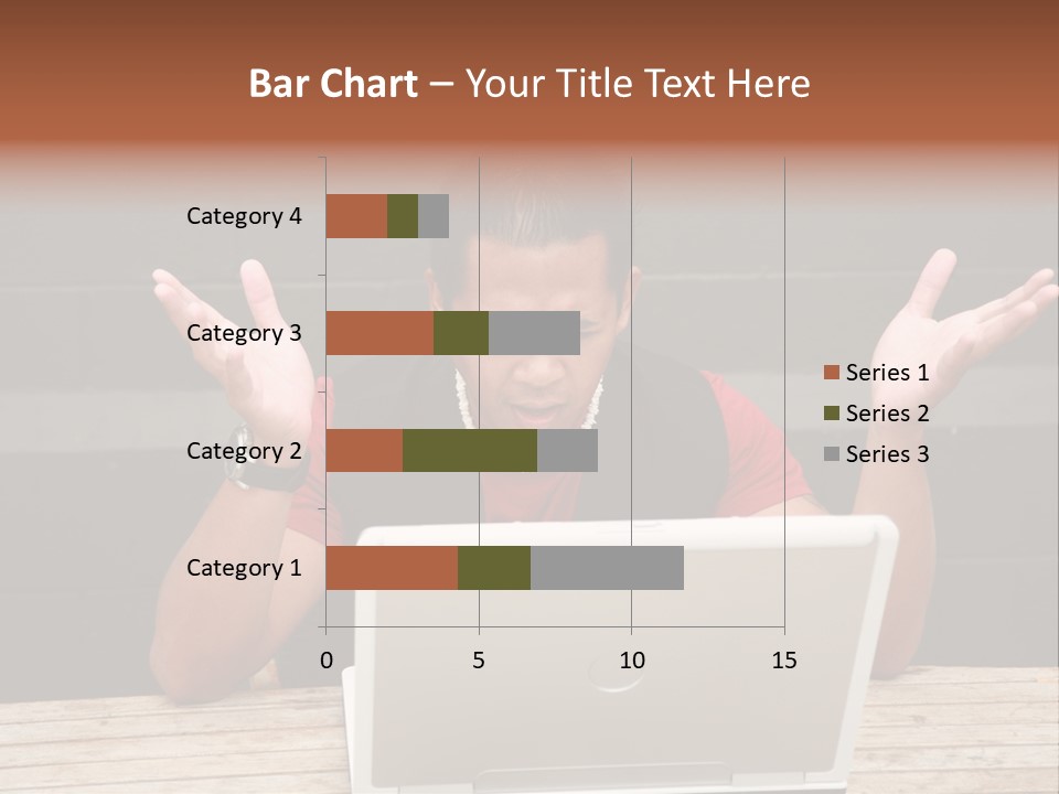 A Man Sitting In Front Of A Laptop Computer PowerPoint Template