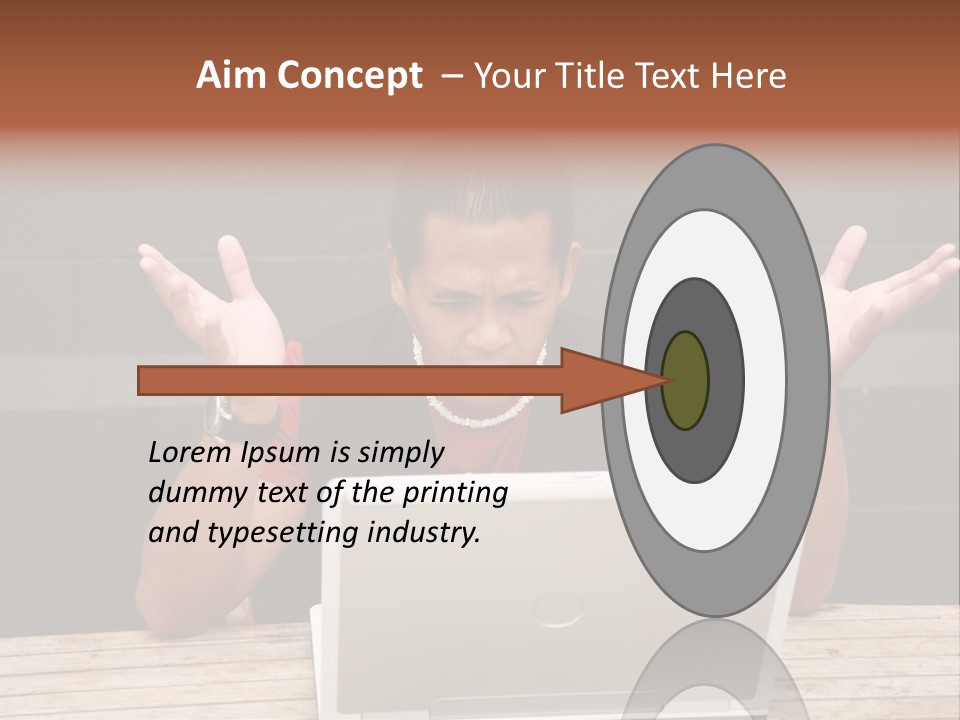 A Man Sitting In Front Of A Laptop Computer PowerPoint Template