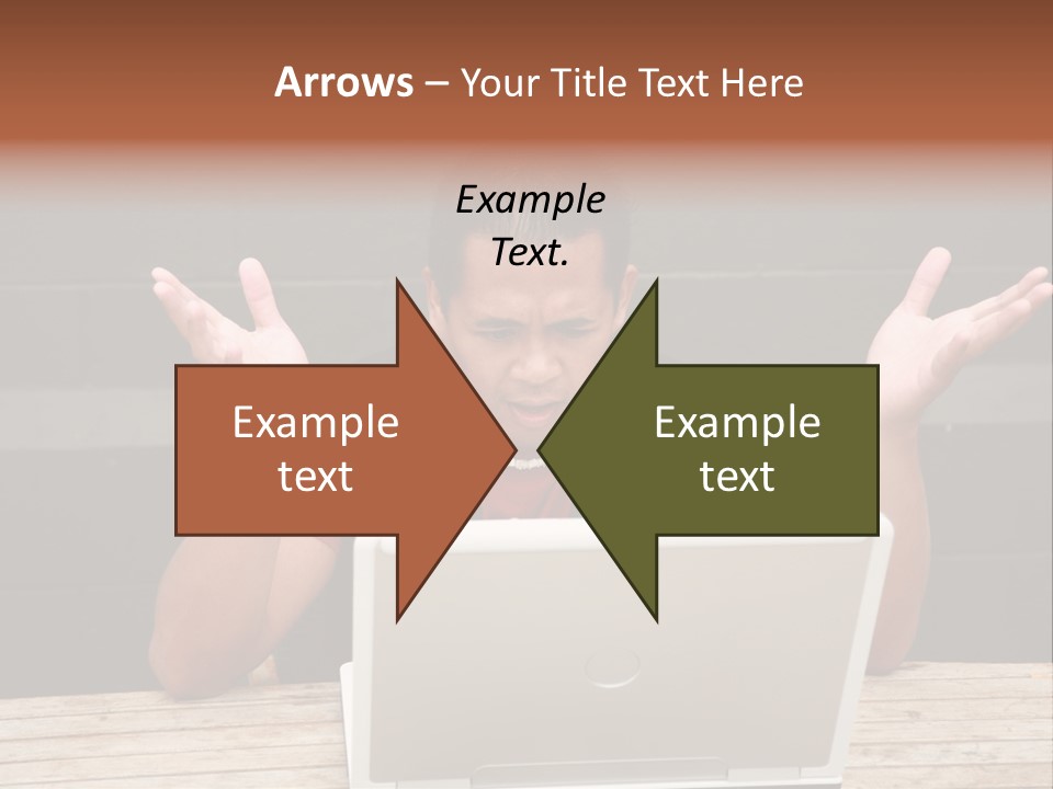 A Man Sitting In Front Of A Laptop Computer PowerPoint Template