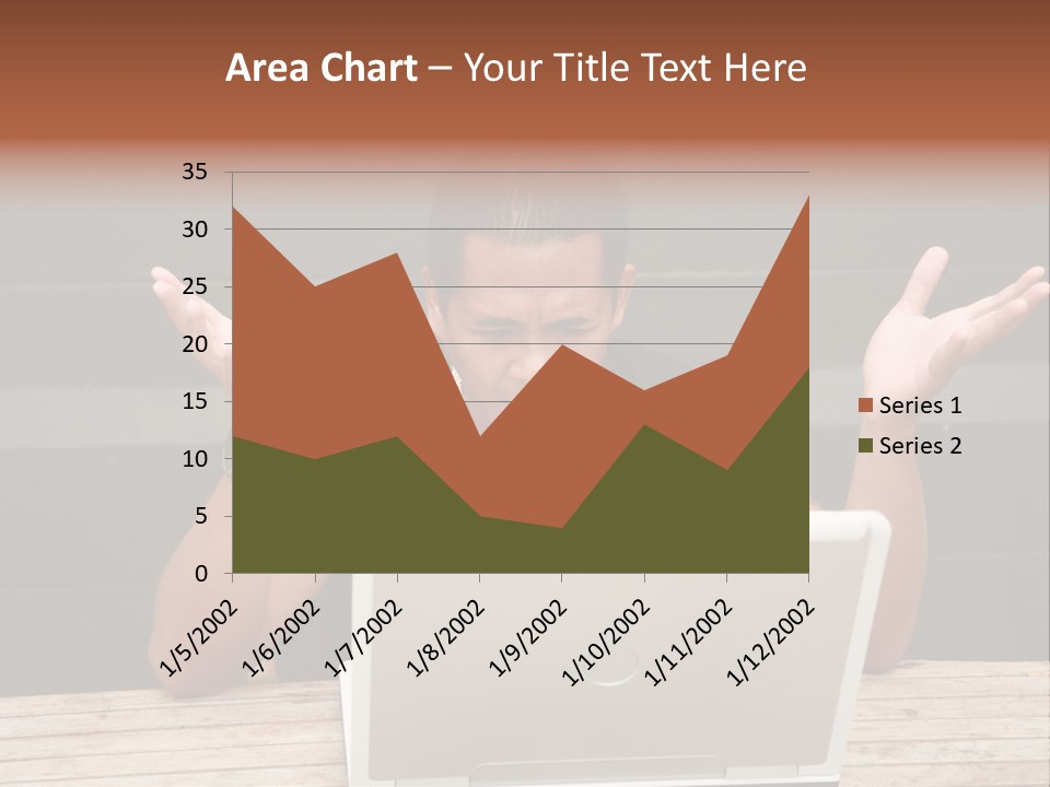 A Man Sitting In Front Of A Laptop Computer PowerPoint Template