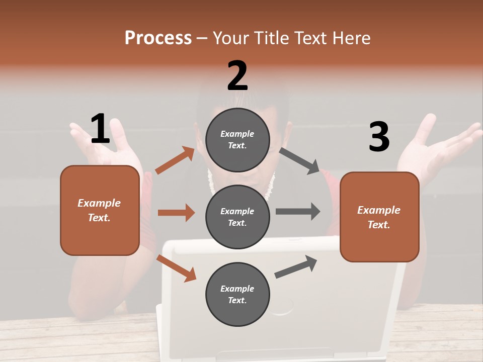 A Man Sitting In Front Of A Laptop Computer PowerPoint Template