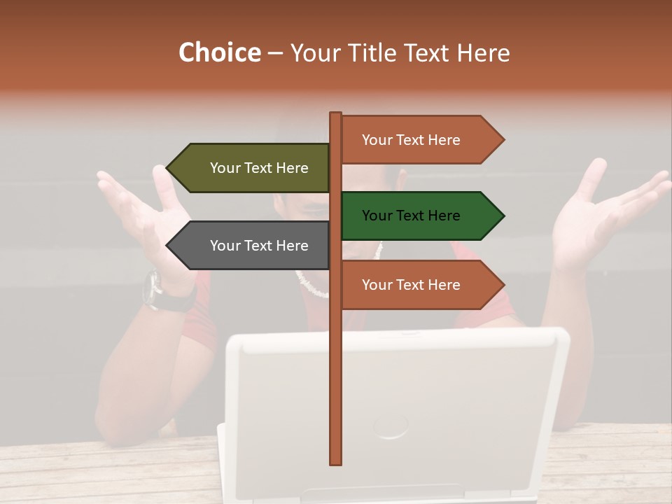 A Man Sitting In Front Of A Laptop Computer PowerPoint Template