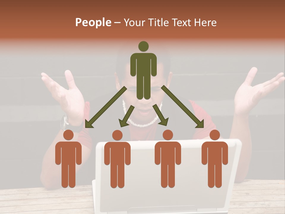 A Man Sitting In Front Of A Laptop Computer PowerPoint Template