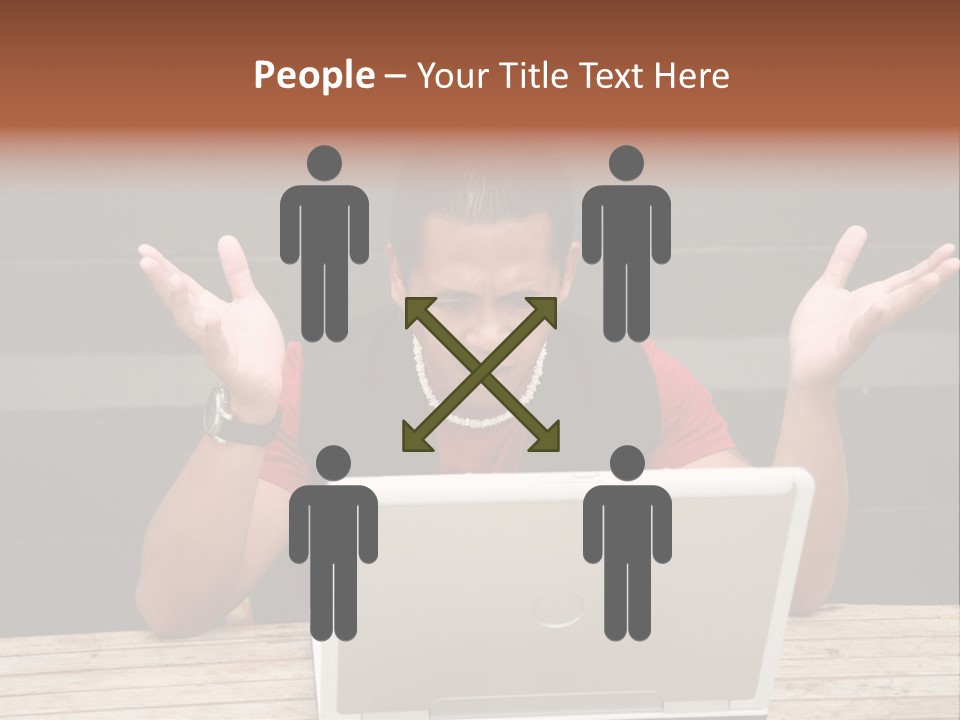 A Man Sitting In Front Of A Laptop Computer PowerPoint Template