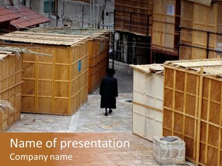 A Man Walking Through A Group Of Wooden Crates PowerPoint Template