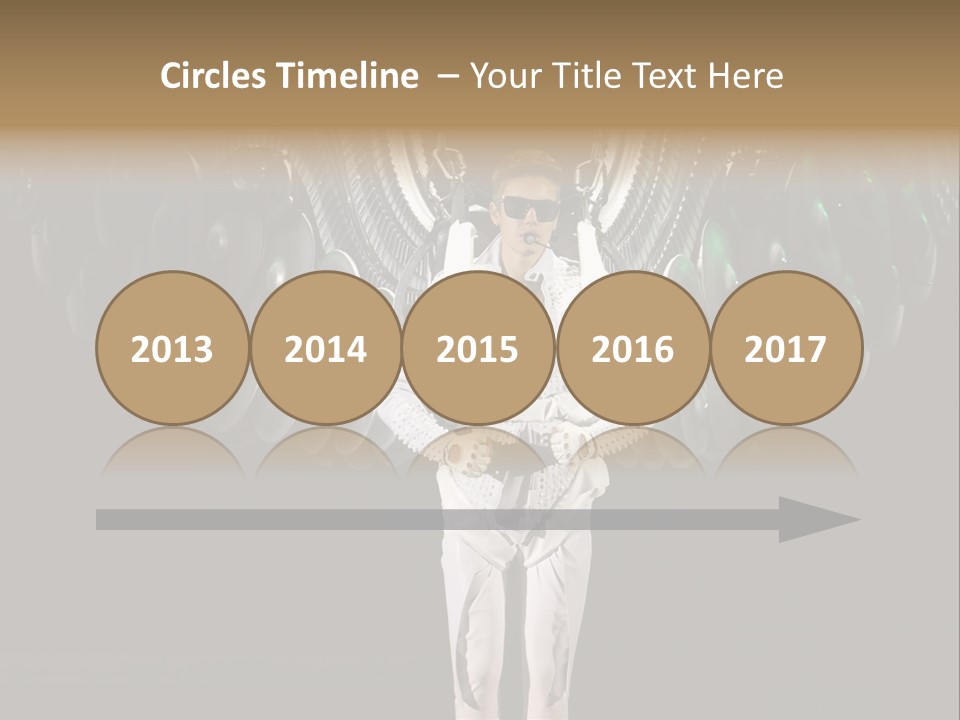 A Man Standing On A Stage With Lots Of Balloons In The Background PowerPoint Template