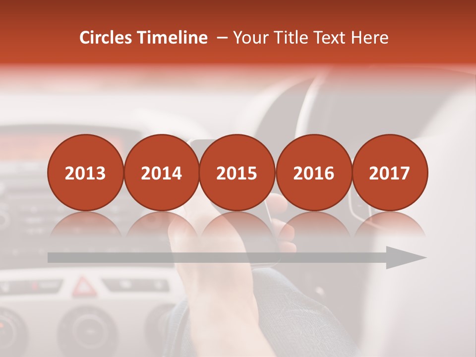 A Person Holding A Cell Phone While Driving A Car PowerPoint Template