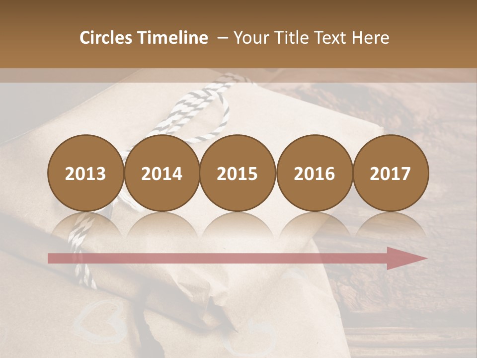 A Knife And Some Wrapped Presents On A Table PowerPoint Template