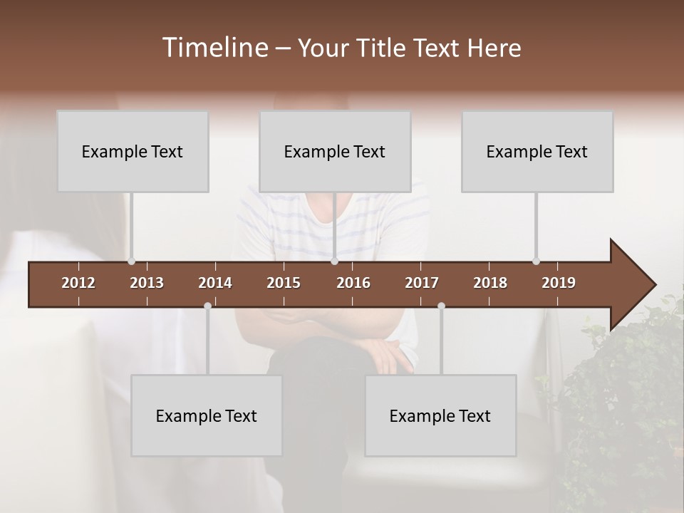 A Man Sitting On A Couch Talking To A Woman PowerPoint Template