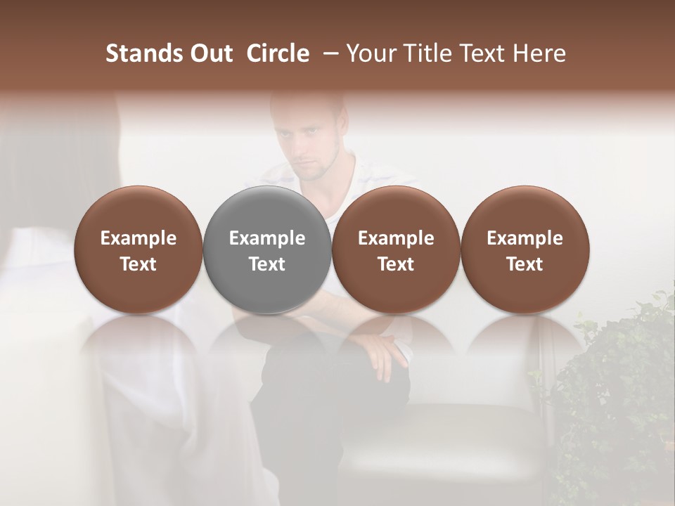 A Man Sitting On A Couch Talking To A Woman PowerPoint Template