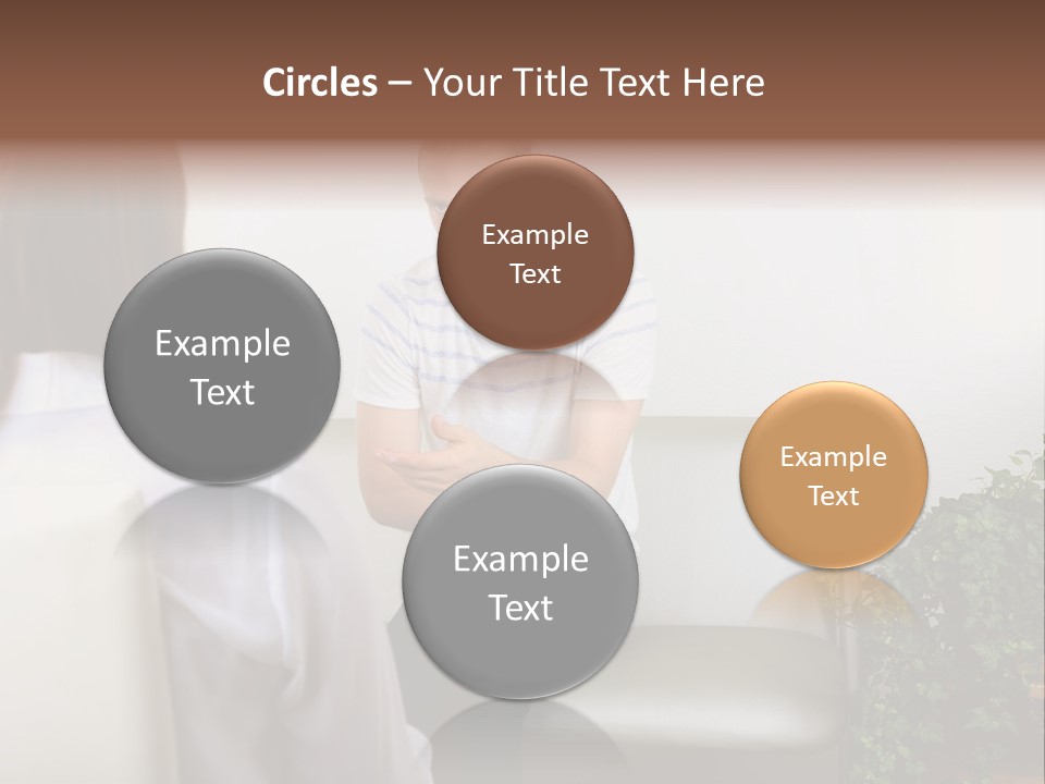 A Man Sitting On A Couch Talking To A Woman PowerPoint Template