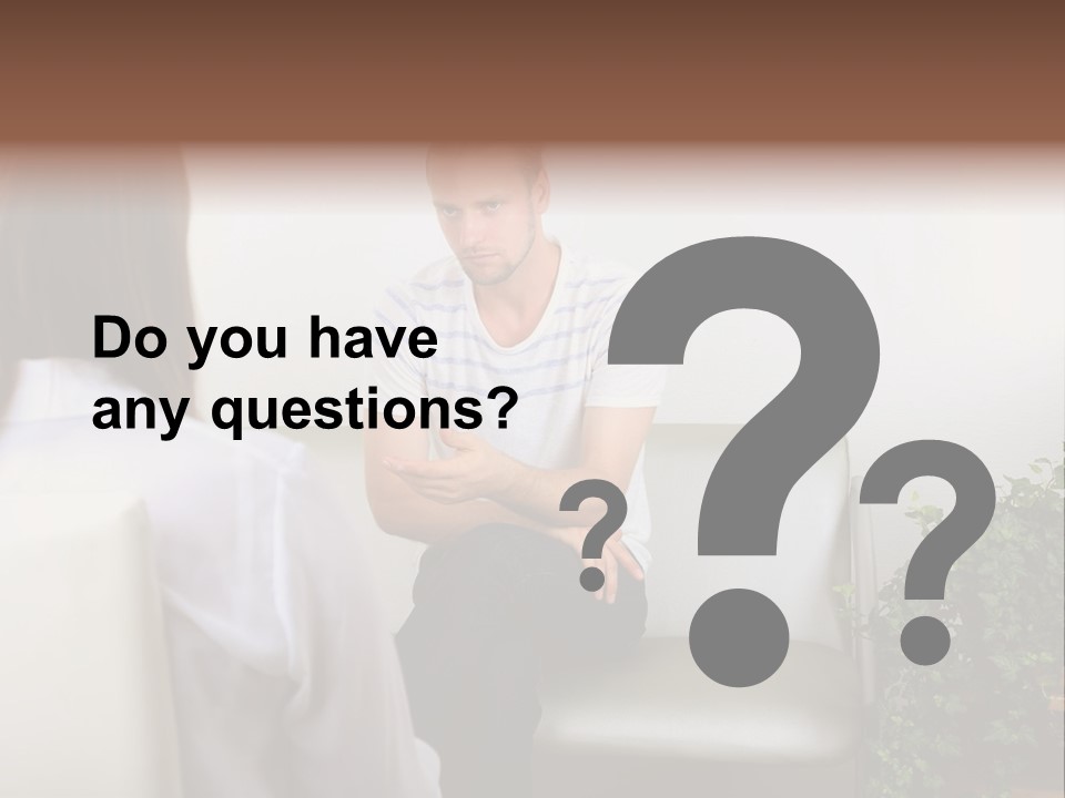 A Man Sitting On A Couch Talking To A Woman PowerPoint Template