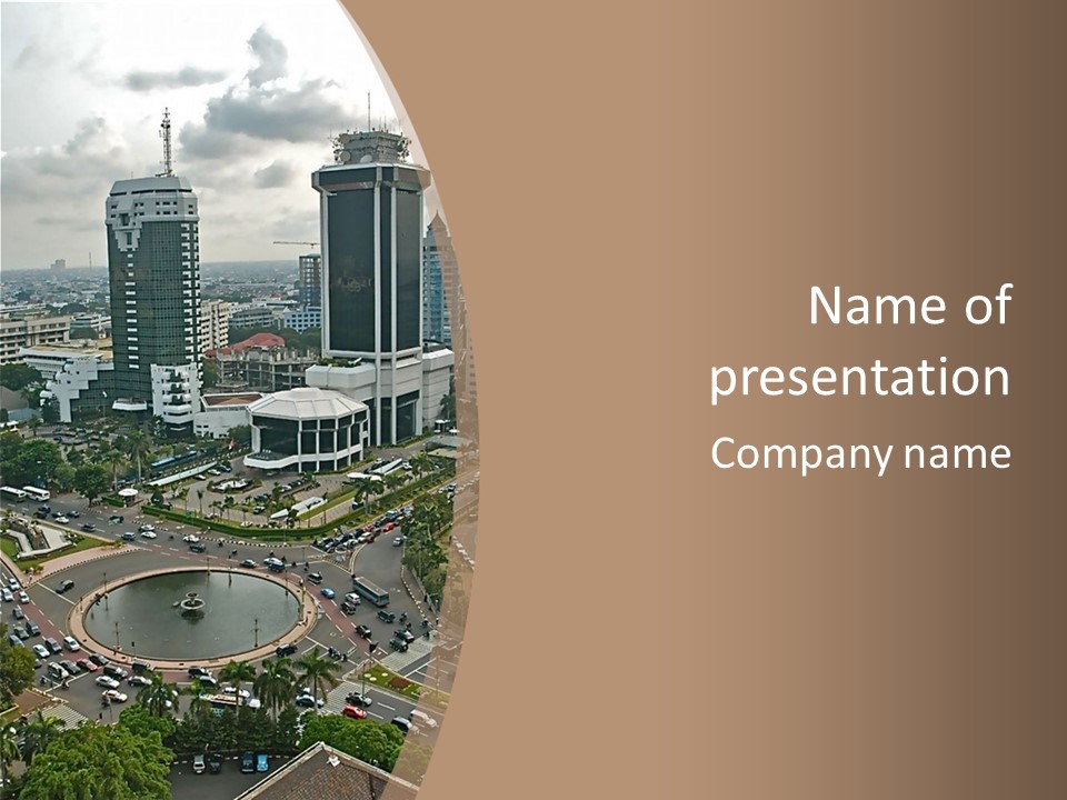 An Aerial View Of A City With A Fountain PowerPoint Template