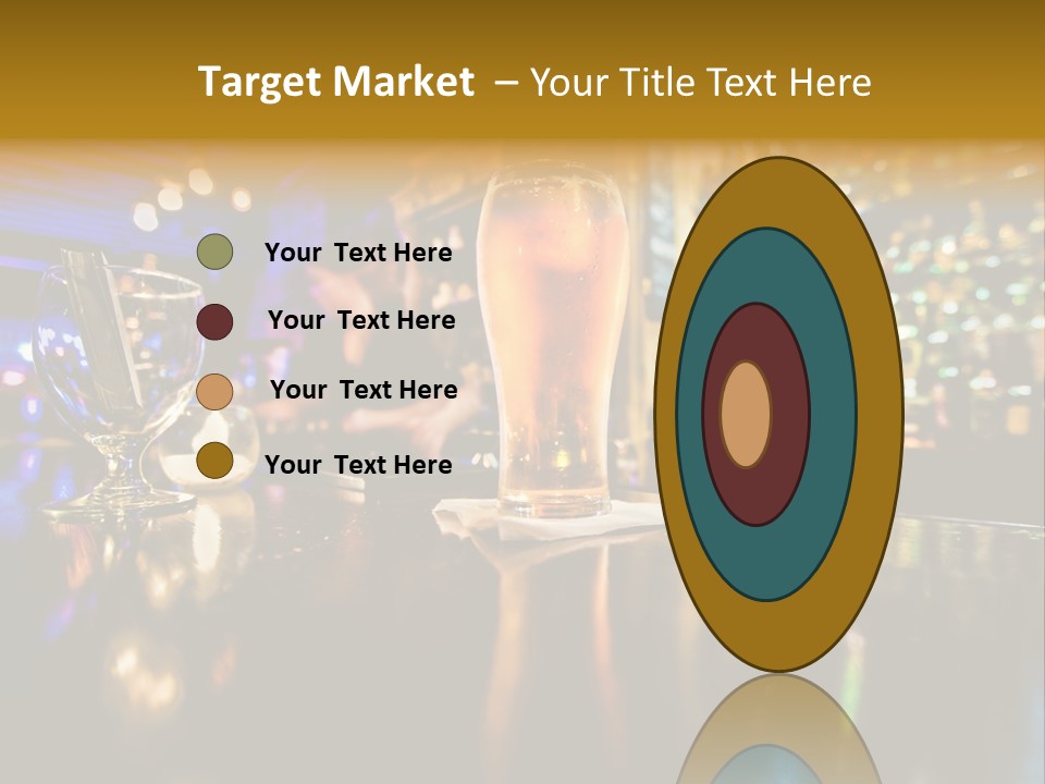 A Glass Of Beer Sitting On Top Of A Table PowerPoint Template
