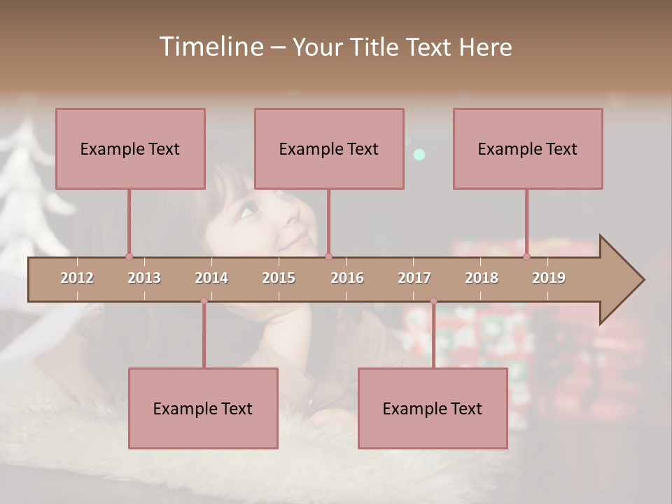 A Little Girl Sitting In Front Of A Christmas Tree PowerPoint Template