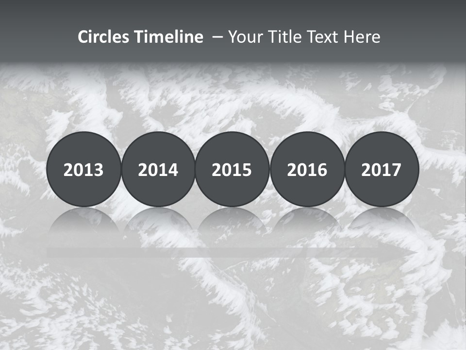 An Aerial View Of Snow Covered Rocks And Trees PowerPoint Template