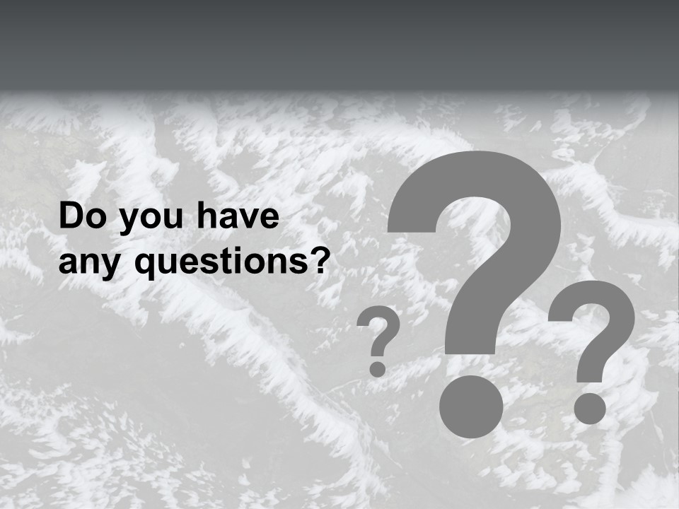 An Aerial View Of Snow Covered Rocks And Trees PowerPoint Template