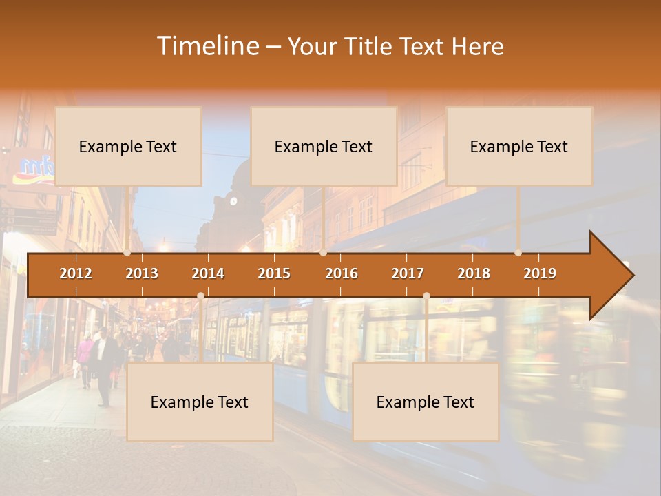 A Blue Train Traveling Down A Street Next To Tall Buildings PowerPoint Template