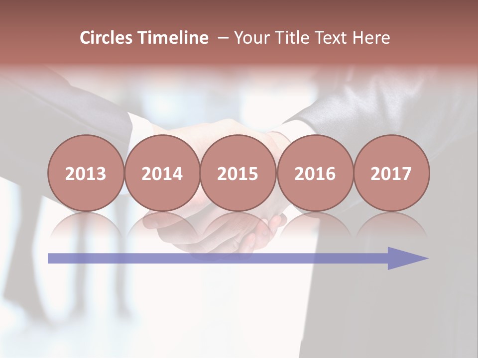 Two People Shaking Hands In Front Of A Group Of People PowerPoint Template