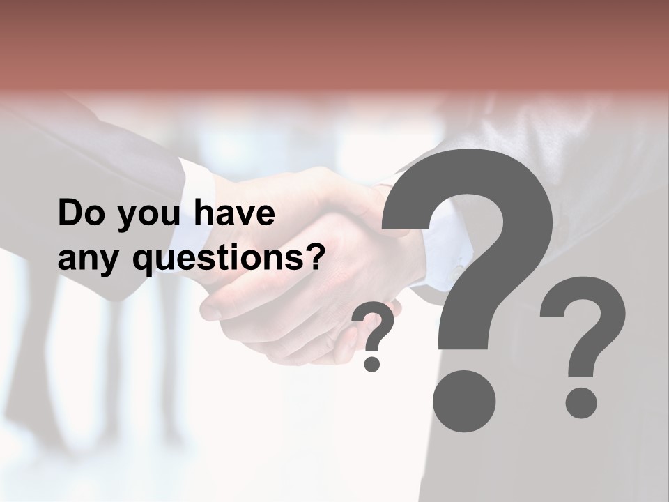 Two People Shaking Hands In Front Of A Group Of People PowerPoint Template