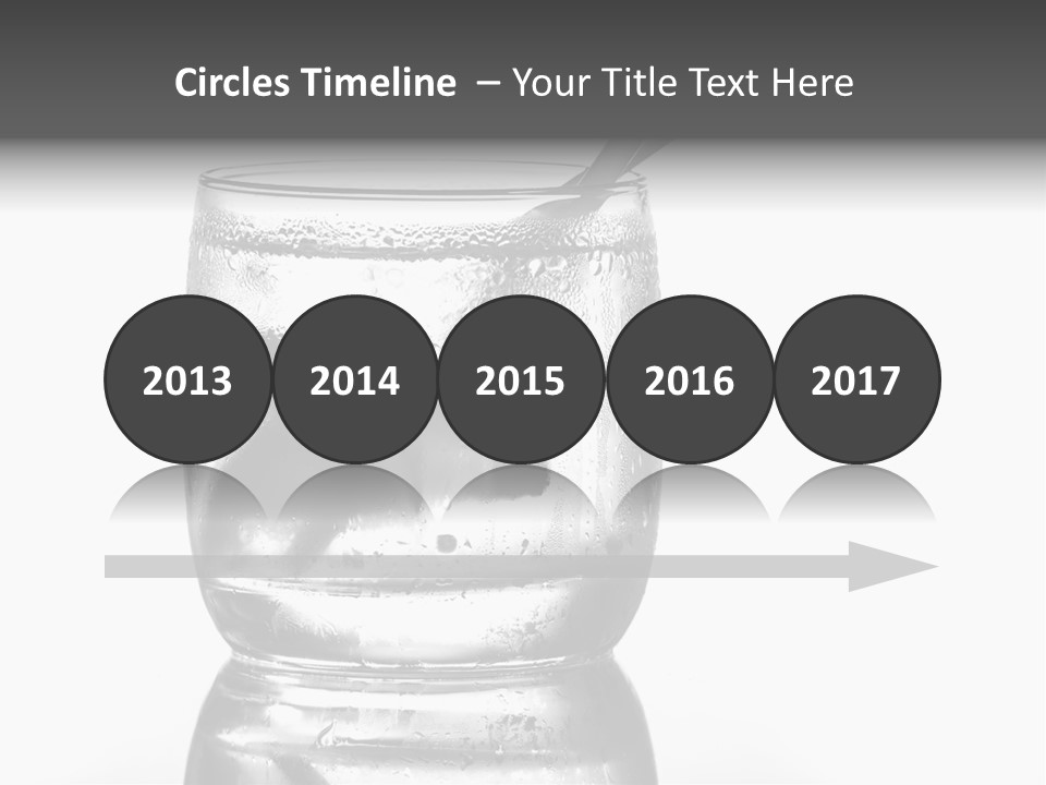 A Glass Of Water With A Spoon In It PowerPoint Template