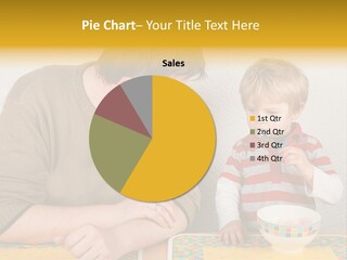 A Man And A Young Boy Sitting At A Table With A Bowl Of Food PowerPoint Template