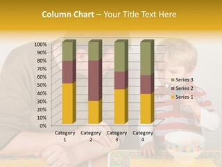 A Man And A Young Boy Sitting At A Table With A Bowl Of Food PowerPoint Template