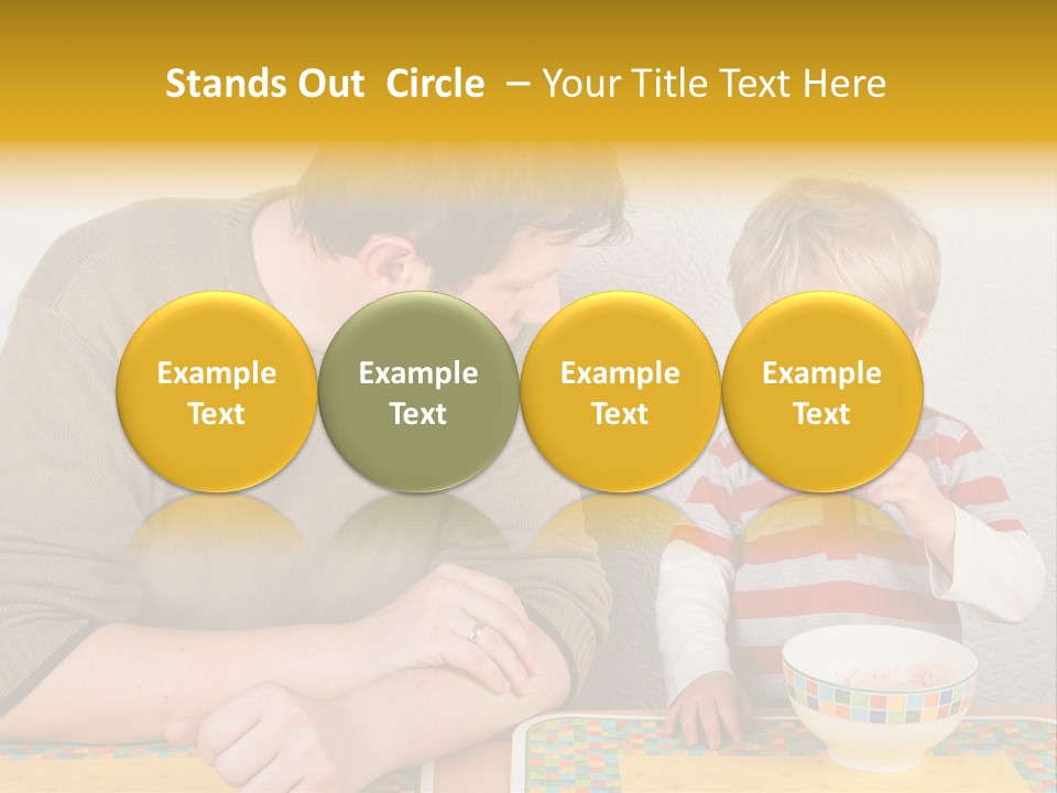 A Man And A Young Boy Sitting At A Table With A Bowl Of Food PowerPoint Template