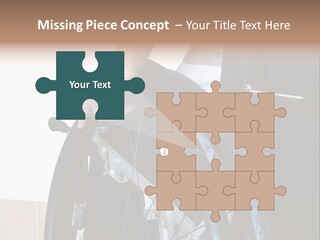 A Man In A Wheelchair Holding The Wheel Of A Wheel Chair PowerPoint Template