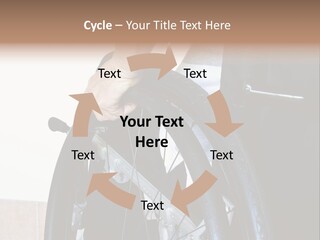 A Man In A Wheelchair Holding The Wheel Of A Wheel Chair PowerPoint Template