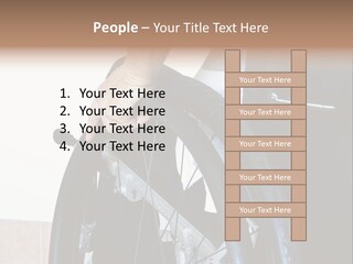 A Man In A Wheelchair Holding The Wheel Of A Wheel Chair PowerPoint Template