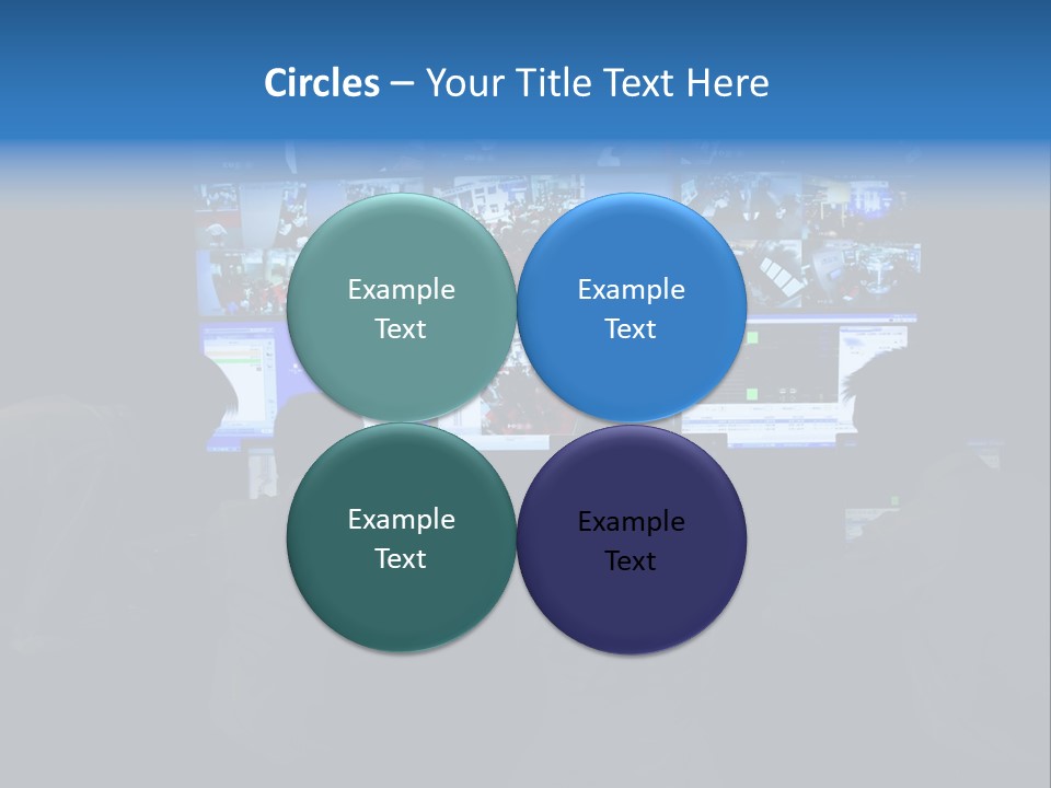 A Group Of People Sitting In Front Of Computer Screens PowerPoint Template