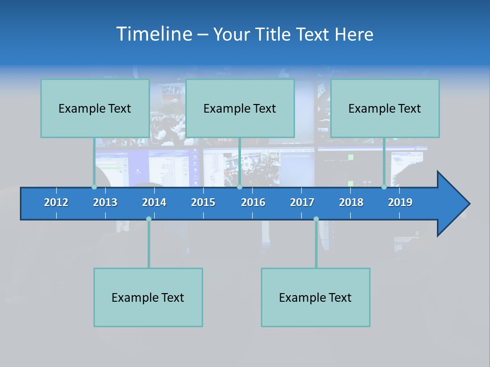 A Group Of People Sitting In Front Of Computer Screens PowerPoint Template
