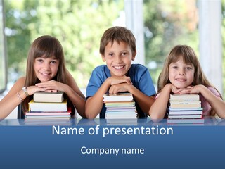 A Group Of Children Sitting At A Table With Books PowerPoint Template