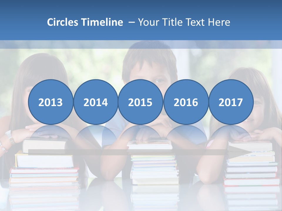 A Group Of Children Sitting At A Table With Books PowerPoint Template