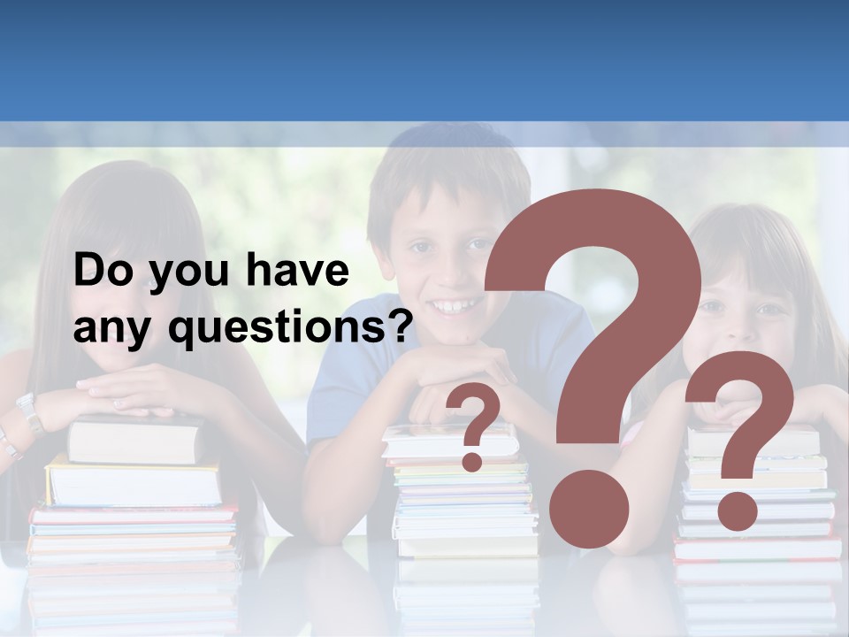 A Group Of Children Sitting At A Table With Books PowerPoint Template