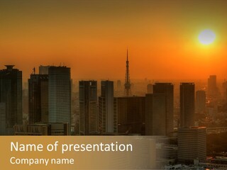 A City Skyline With The Sun Setting In The Background PowerPoint Template