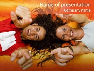 A Man And A Woman Laying On A Bed Together PowerPoint Template