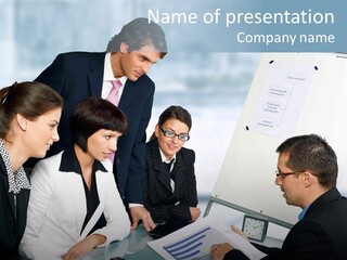 A Group Of Business People Looking At A Presentation PowerPoint Template