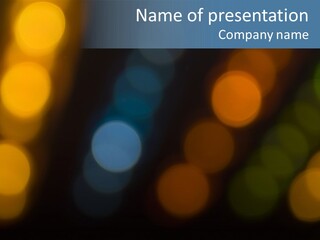 A Blurry Image Of Lights On A Dark Background PowerPoint Template
