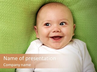 A Smiling Baby Laying On A Green Blanket PowerPoint Template