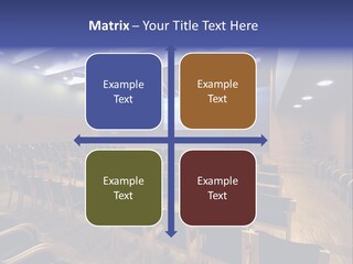 A Lecture Hall With Rows Of Chairs And A Projector Screen PowerPoint Template