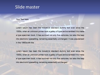 A Lecture Hall With Rows Of Chairs And A Projector Screen PowerPoint Template